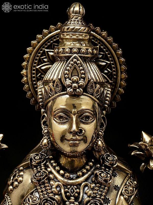 Exotic India 10" Superfine Four Armed Goddess Lakshmi With Wealth Pot | Brass Statue 