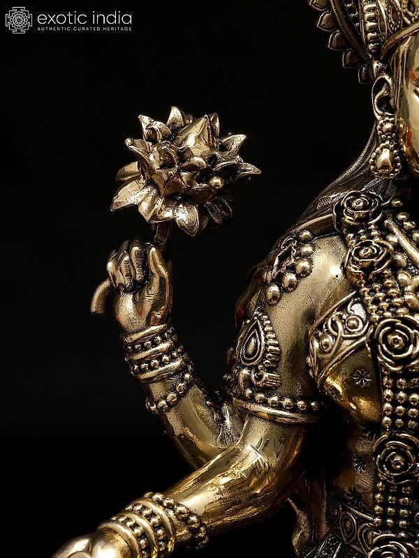 Exotic India 10" Superfine Four Armed Goddess Lakshmi With Wealth Pot | Brass Statue 