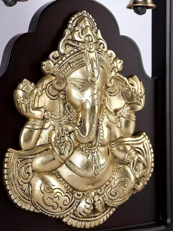 Exotic India 12" Blessing Lord Ganesha Wall Hanging Fame With Bells | Brass And Wood 