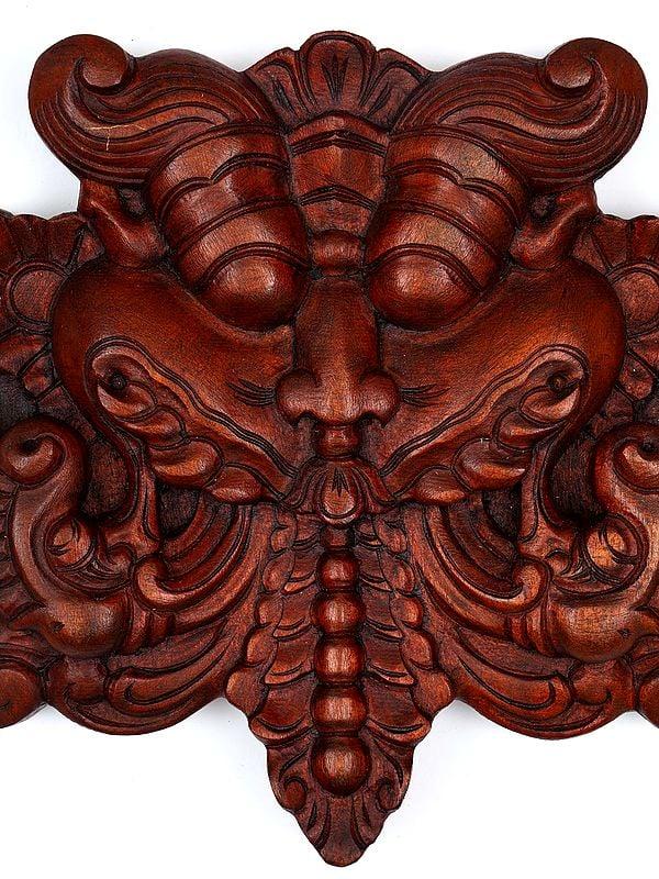 Exotic India 12" Kirtimukha Wall Hanging Statue | Wood Carving 