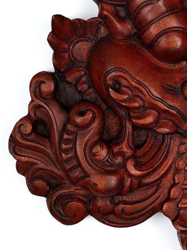 Exotic India 12" Kirtimukha Wall Hanging Statue | Wood Carving 