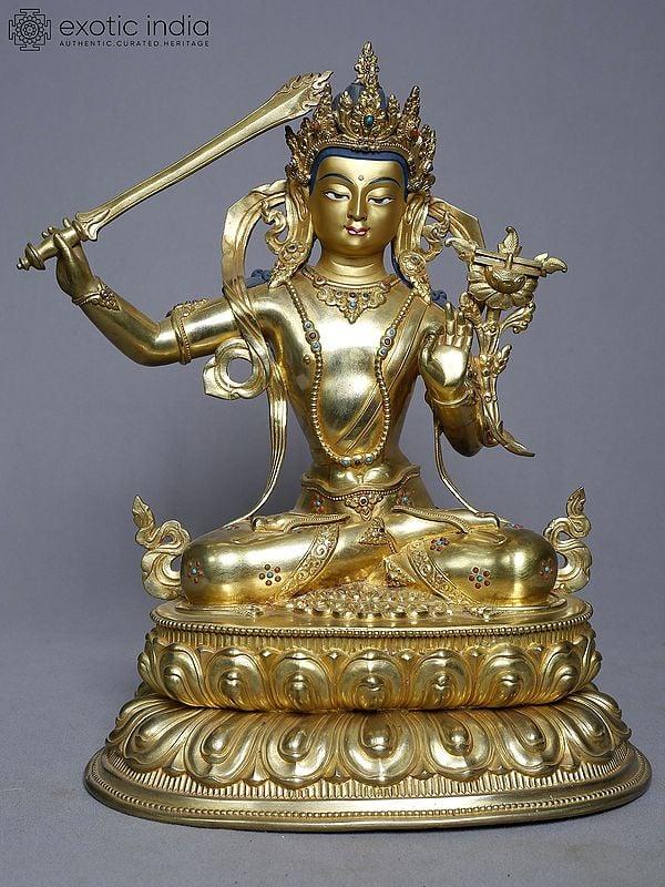 exotic india 13" Seated Tibetan Buddhist Manjushree With Sword In Copper Gold Plated | Handmade 