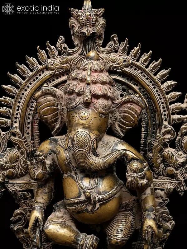 Exotic India 14" Four Armed Dancing Lord Ganesha On Kirtimukha Throne | Brass Statue 