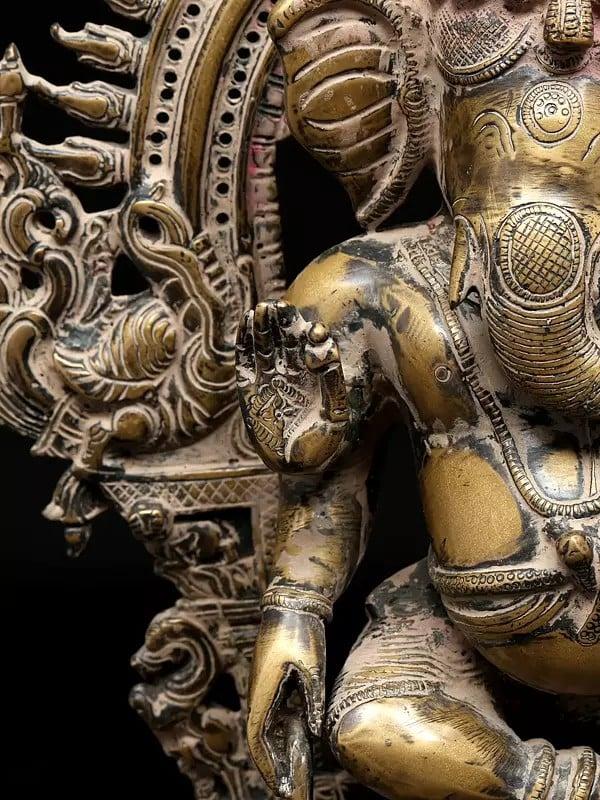 Exotic India 14" Four Armed Dancing Lord Ganesha On Kirtimukha Throne | Brass Statue 
