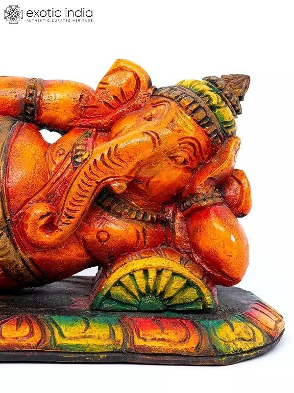 Exotic India 14" Sleeping/Relaxing Lord Ganesha | Wood Carving 