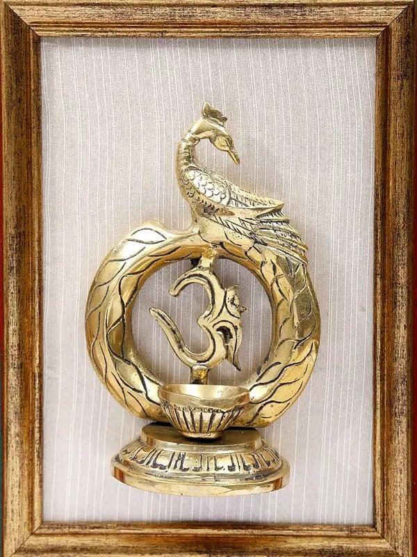 Exotic India 15" Brass Stylized Om (Aum) Diya With Peacock | Wood Framed | Wall Hanging 