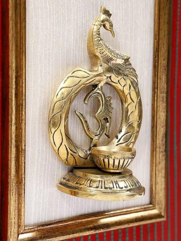 Exotic India 15" Brass Stylized Om (Aum) Diya With Peacock | Wood Framed | Wall Hanging 