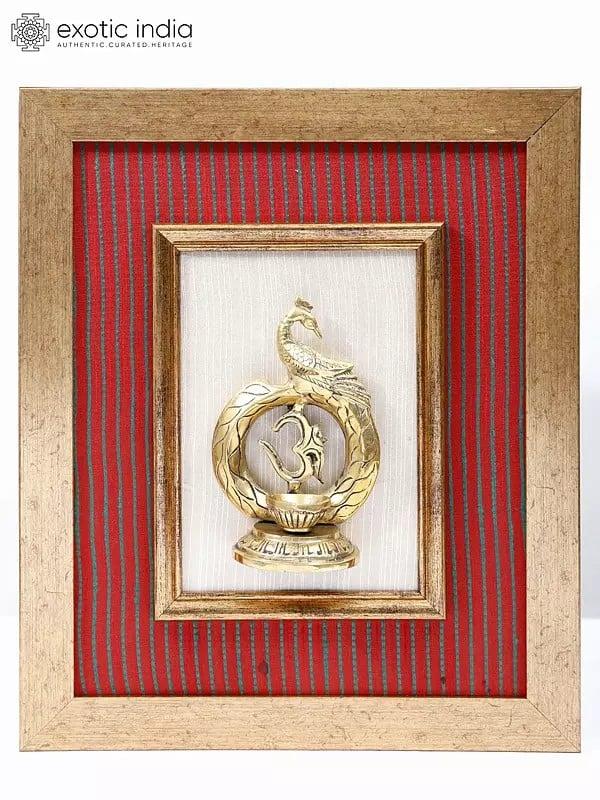 exotic india 15" Brass Stylized Om (Aum) Diya with Peacock | Wood Framed | Wall Hanging 