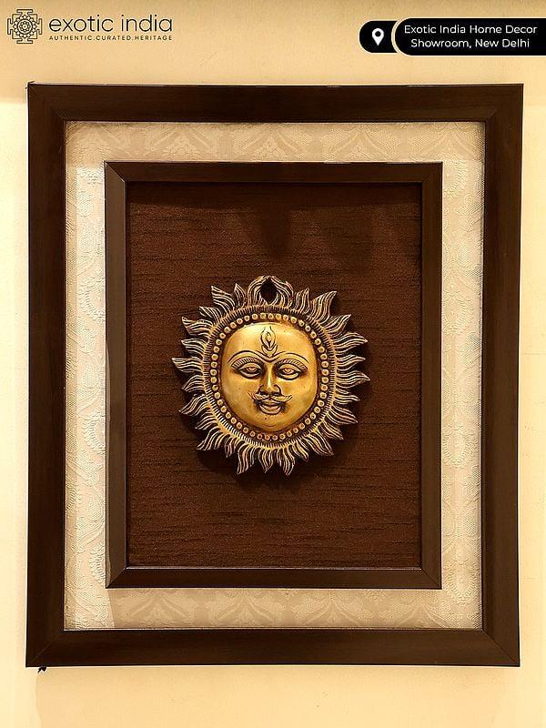 Exotic India 16" Lord Surya Wood Framed Brass Sculpture | Wall Hanging 