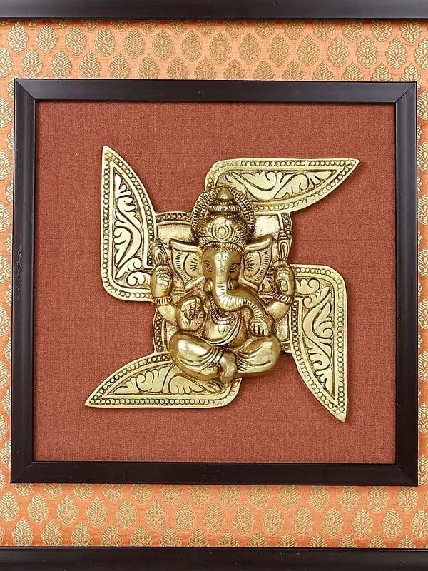 Exotic India 16" Swastik Ganesha | Wood Framed Brass Sculpture | Wall Hanging 
