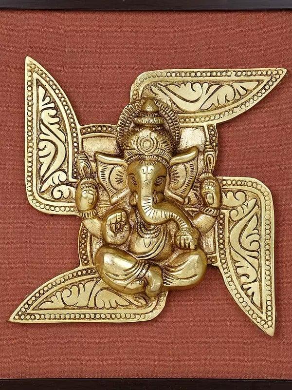 Exotic India 16" Swastik Ganesha | Wood Framed Brass Sculpture | Wall Hanging 