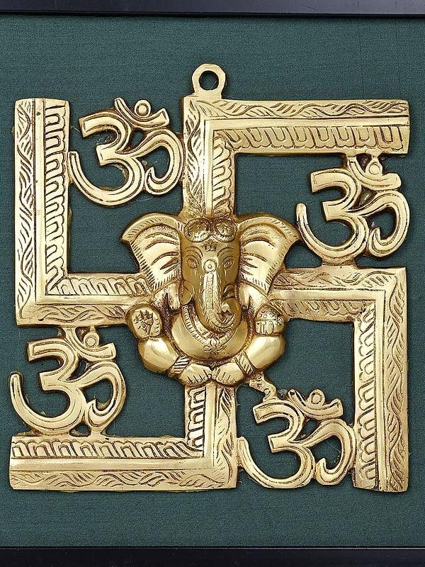 Exotic India 17" Blessing Lord Ganesha With Hindu Symbols Om And Swastik | Wall Hanging Wood Framed Brass Sculpture 