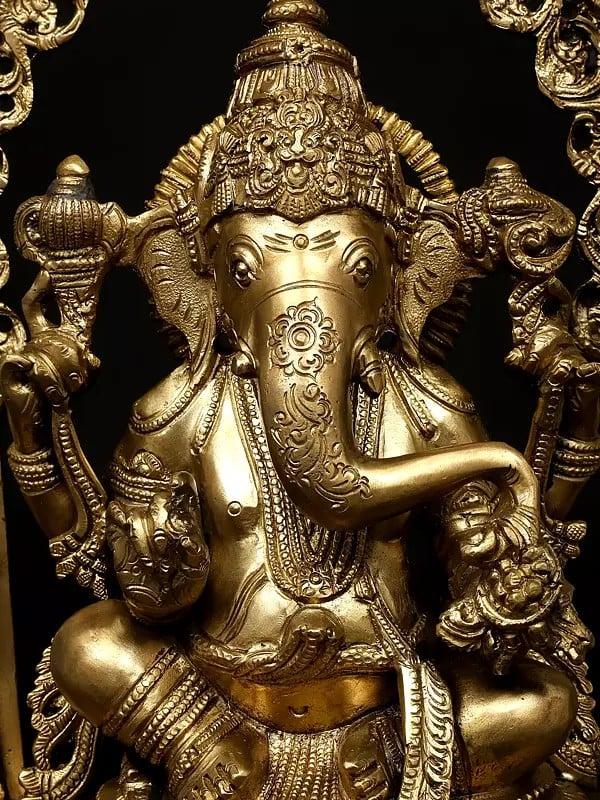 Exotic India 17" Chaturbhuja Lord Ganesha Seated On Kirtimukha Throne | Hoysala Bronze Statue 