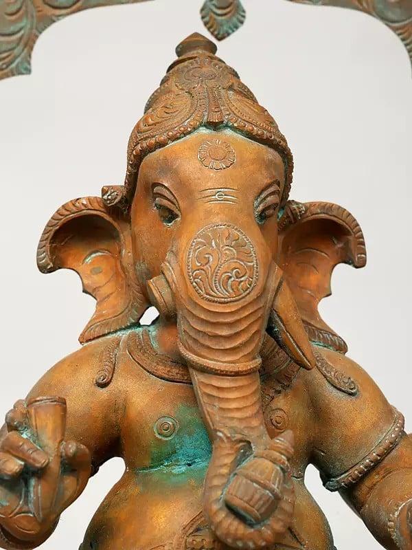 Exotic India 17" Four Armed Lord Ganesha Seated On Kirtimukha Throne | Madhuchista Vidhana (Lost-Wax) | Panchaloha Bronze From Swamimalai 