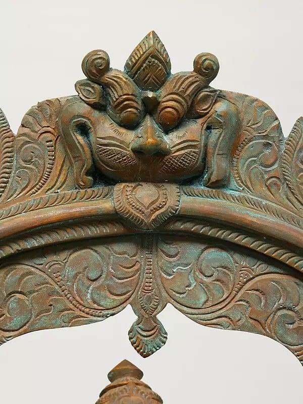 Exotic India 17" Four Armed Lord Ganesha Seated On Kirtimukha Throne | Madhuchista Vidhana (Lost-Wax) | Panchaloha Bronze From Swamimalai 