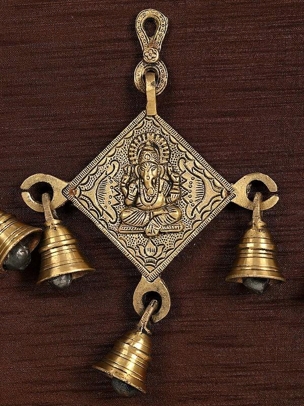 Exotic India 17" Lakshmi Ganesha And Saraswati With Bells In Brass | Wooden Wall Hanging Frame 