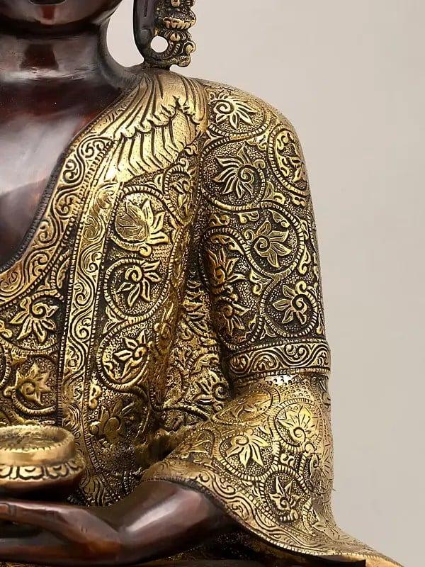 Exotic India 17" Lord Buddha Seated In Vitark Mudra With Floral Carving On Robe | Brass Statue 