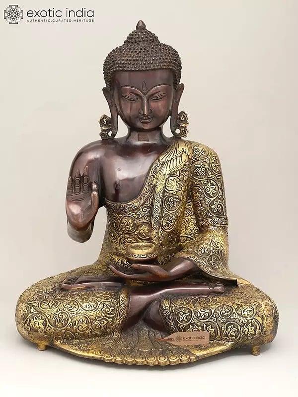 exotic india 17" Lord Buddha Seated in Vitark Mudra with Floral Carving on Robe | Brass Statue 