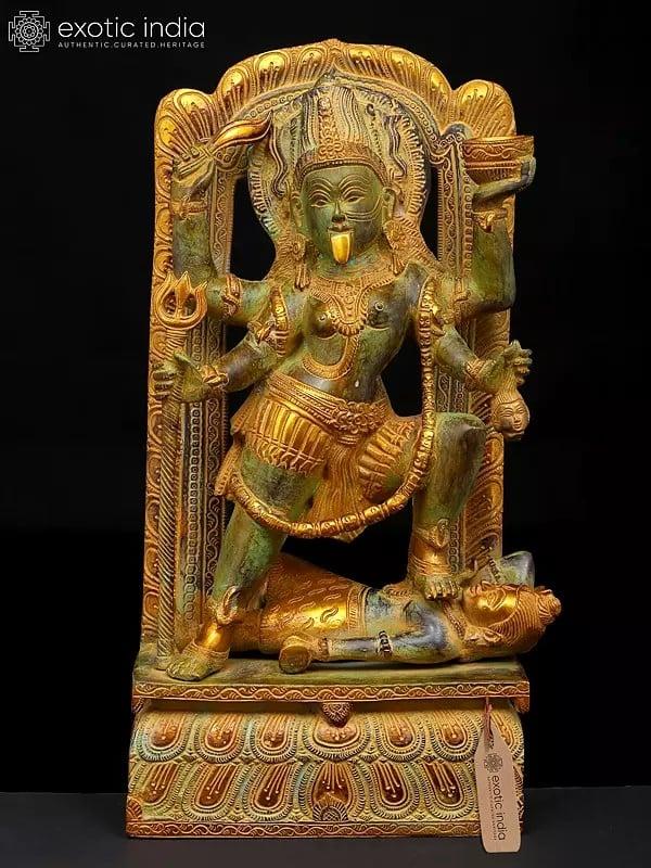 exotic india 17" The Fearless Destroyer - Goddess Kali Standing on Lord Shiva | Brass Statue 