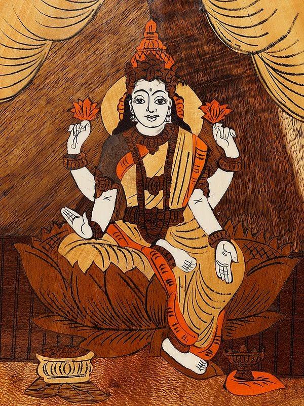 Exotic India 18" Goddess Lakshmi Seated In Blessing Posture | Rosewood Panel With Inlay Work 