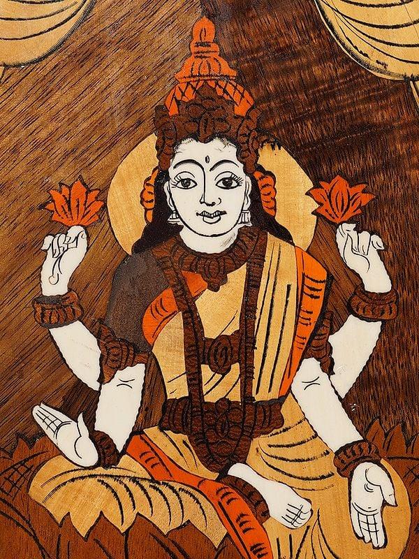 Exotic India 18" Goddess Lakshmi Seated In Blessing Posture | Rosewood Panel With Inlay Work 