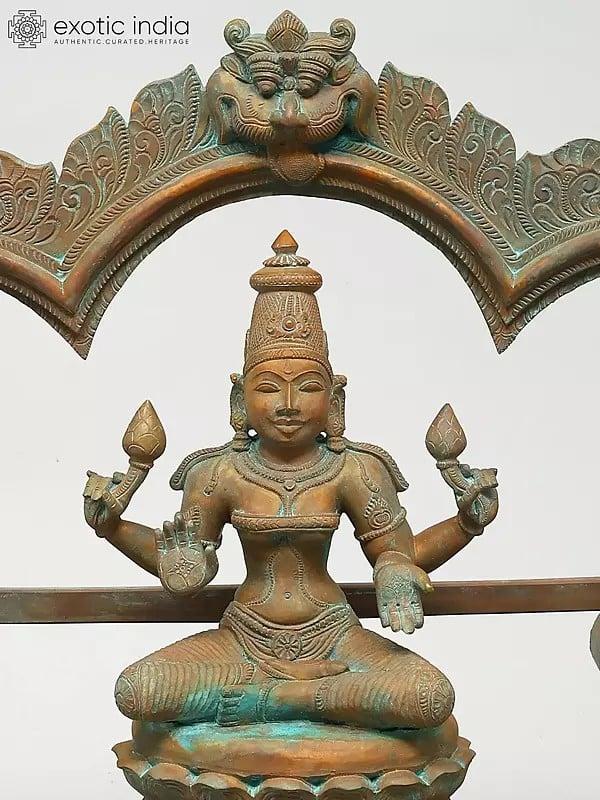 Exotic India 19" Goddess Gajalakshmi With Kirtimukha Arch | Madhuchista Vidhana (Lost-Wax) | Panchaloha Bronze From Swamimalai 