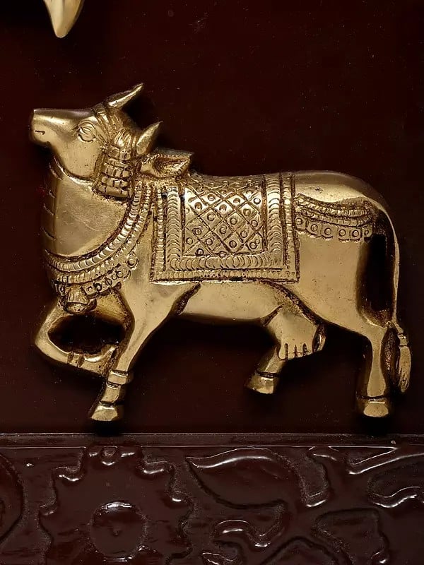 Exotic India 19" Kamadhenu Cows With Trishul/Trident | Wood Framed Brass Sculpture | Wall Hanging 