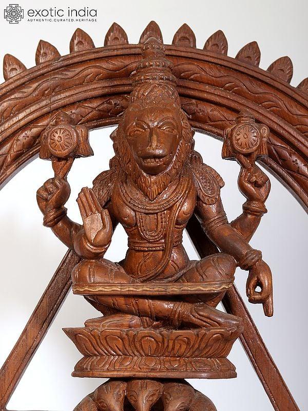 Exotic India 19" Lord Narasimha Seated On Sheshnag (Chakrathalwar) | Teakwood Statue 