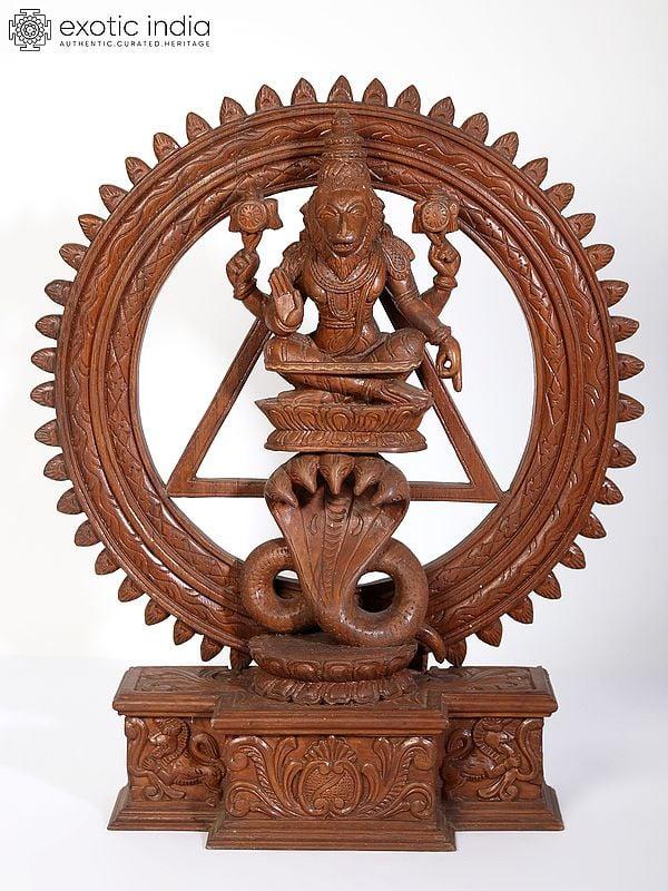 exotic india 19" Lord Narasimha Seated on Sheshnag (Chakrathalwar) | Teakwood Statue 