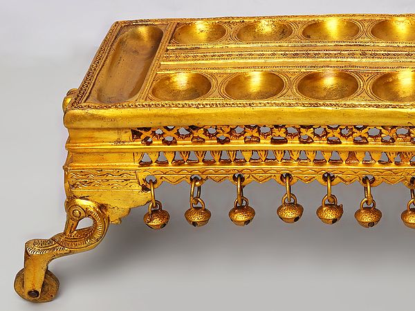 Exotic India 19" Traditional South Indian Game Pallanguzhi With Wheels In Brass 