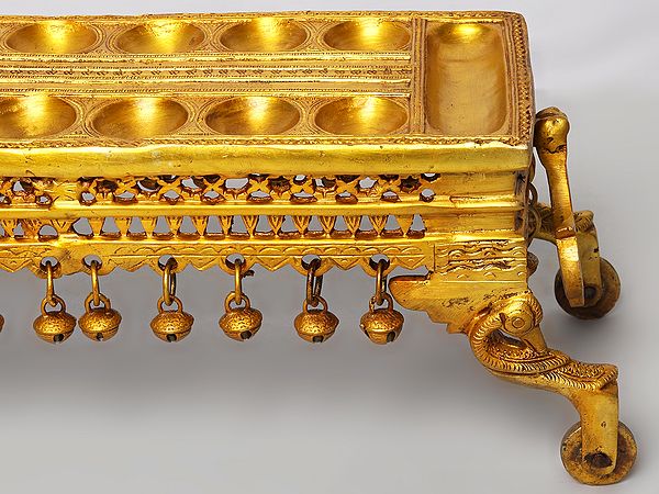 Exotic India 19" Traditional South Indian Game Pallanguzhi With Wheels In Brass 