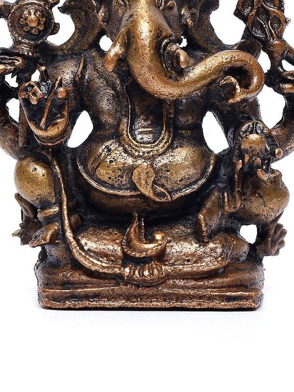 Exotic India 2" Small Chaturbhuja Lord Ganesha | Copper Statue 