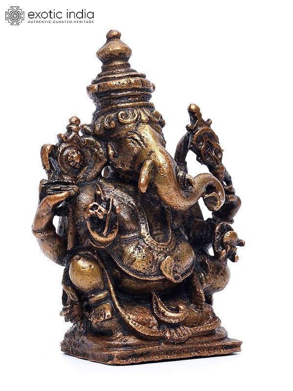 Exotic India 2" Small Chaturbhuja Lord Ganesha | Copper Statue 
