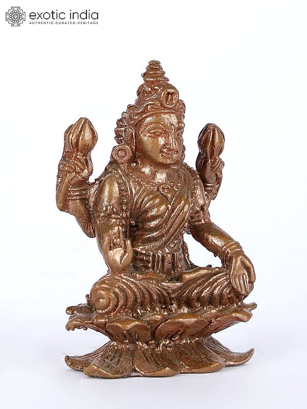 Exotic India 2" Small Four-Armed Goddess Lakshmi Copper Statue On Lotus Pedestal 