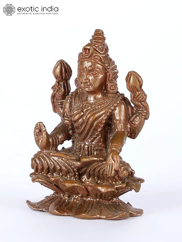 Exotic India 2" Small Four-Armed Goddess Lakshmi Copper Statue On Lotus Pedestal 