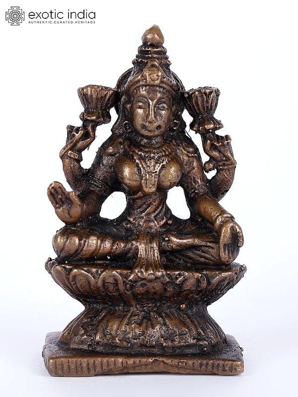 exotic india 2" Small Sitting Goddess Lakshmi Copper Statue 