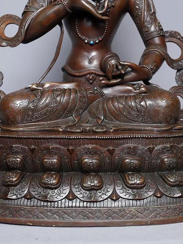 Exotic India 20" Copper Gold Plated Tibetan Buddhist Deity Seated Statue Form Nepal | Handmade 