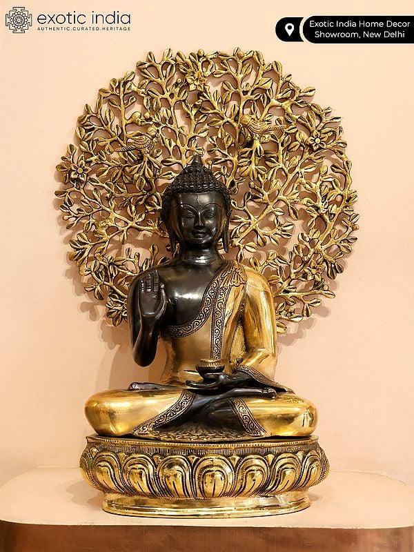 Exotic India 20" Lord Buddha In Vitark Mudra Seated Under The Bodhi Tree | Brass Statue 