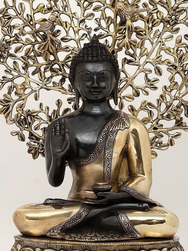 Exotic India 20" Lord Buddha In Vitark Mudra Seated Under The Bodhi Tree | Brass Statue 