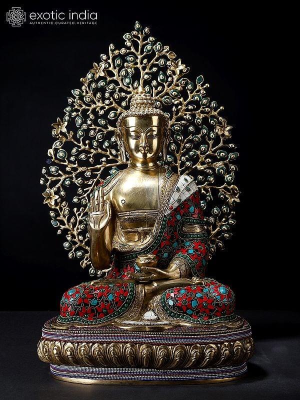 exotic india 20" Superfine Shakyamuni Buddha Inlay Brass Statue with Bodhi Tree as Backdrop 