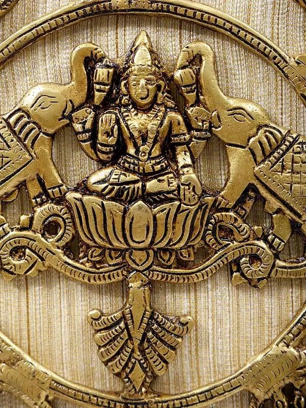 Exotic India 23" Wood Framed Ashtalakshmi In Brass | Wall Hanging 