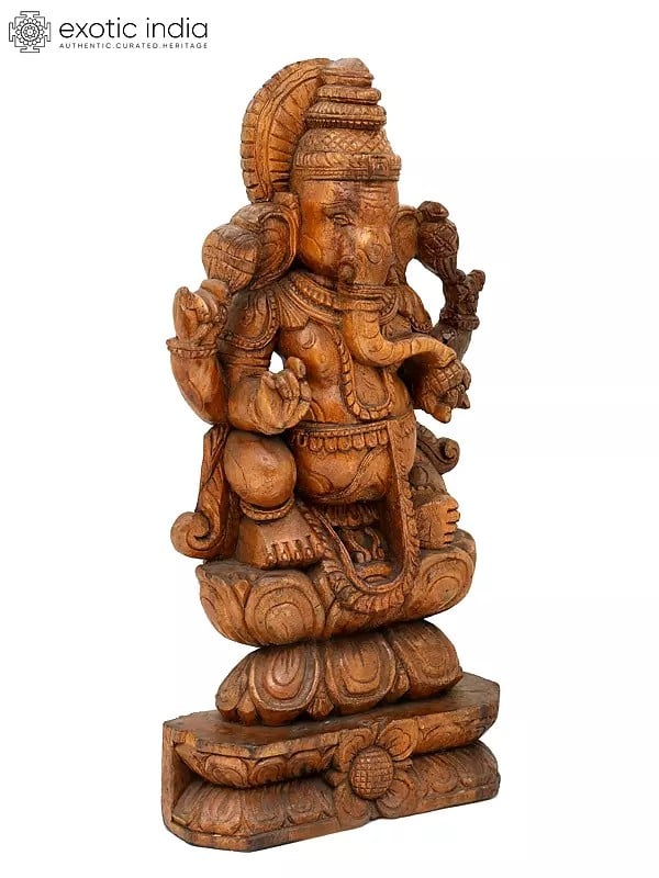 Exotic India 24" Chaturbhuja Lord Ganesha Seated On Lotus | Wood Carving 