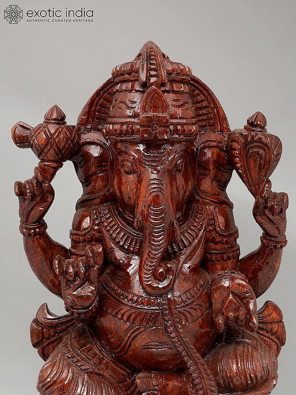 Exotic India 24" Four Armed Lord Ganesha | Wood Carving 