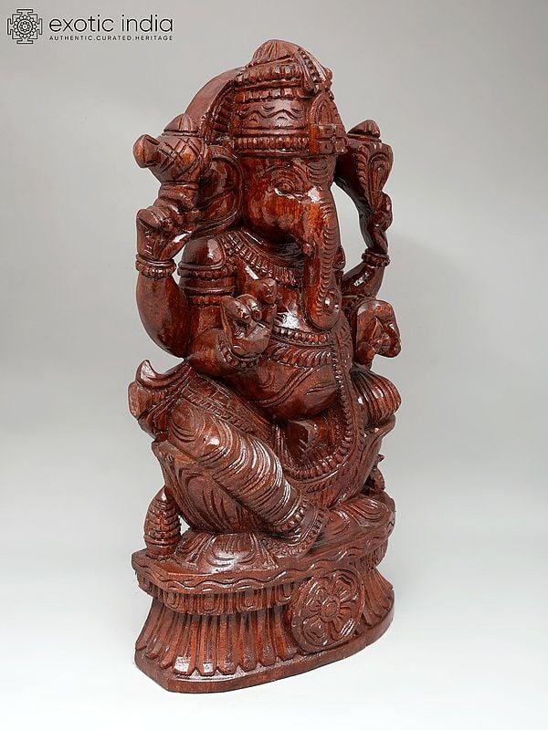 Exotic India 24" Four Armed Lord Ganesha | Wood Carving 
