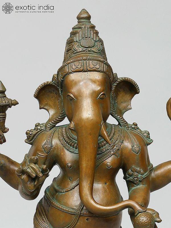 Exotic India 26" Standing Four Armed Lord Ganesha | Madhuchista Vidhana (Lost-Wax) | Panchaloha Bronze From Swamimalai 