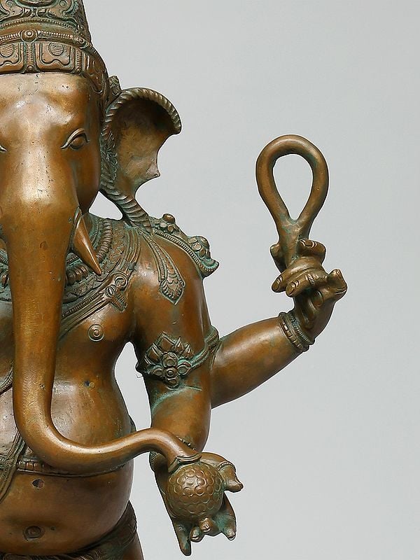 Exotic India 26" Standing Four Armed Lord Ganesha | Madhuchista Vidhana (Lost-Wax) | Panchaloha Bronze From Swamimalai 