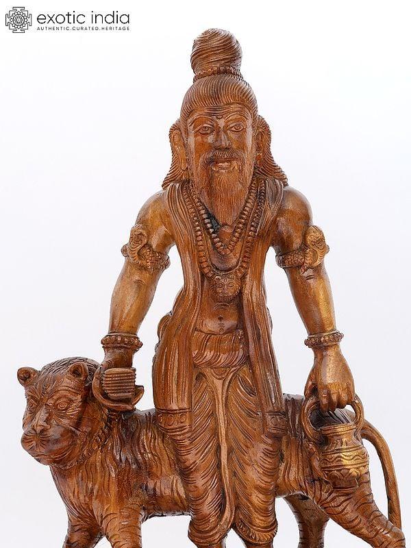 Exotic India 28" Tamil Siddha With Lion | Wood Carving 