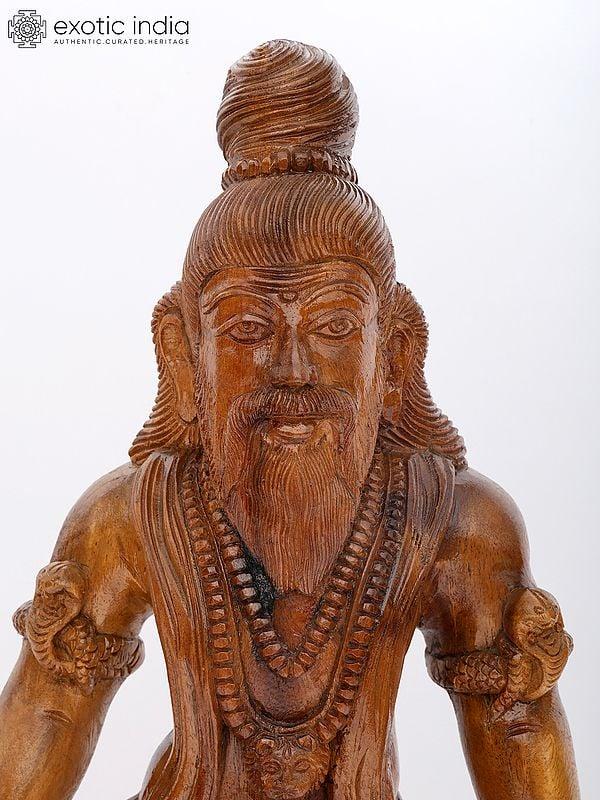 Exotic India 28" Tamil Siddha With Lion | Wood Carving 