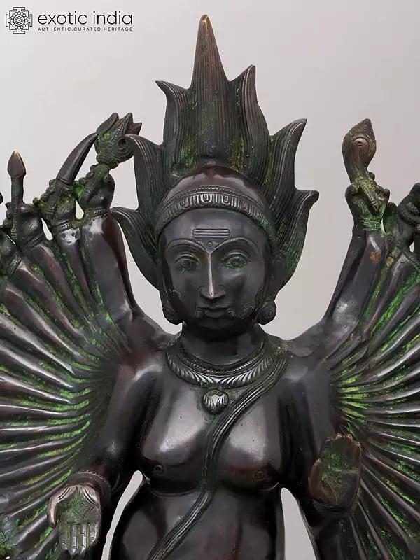 Exotic India 29" Eighteen Armed Goddess Mahakali Standing On Lord Shiva | Brass Statue 