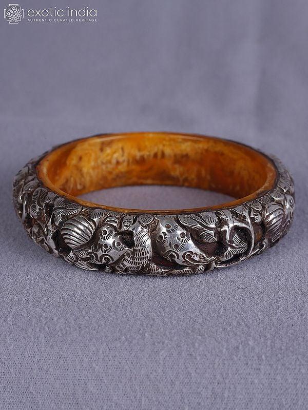 Exotic India 3.5" Engraved Designer Amber And Silver Bangle From Nepal